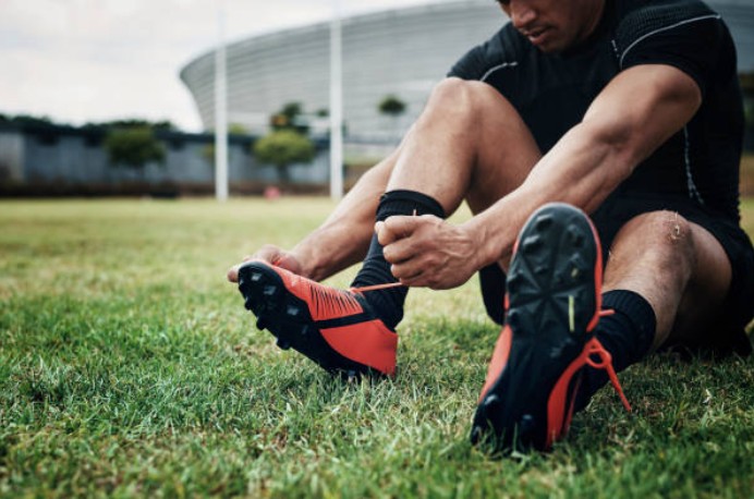 Firm Ground Boots on Astro
